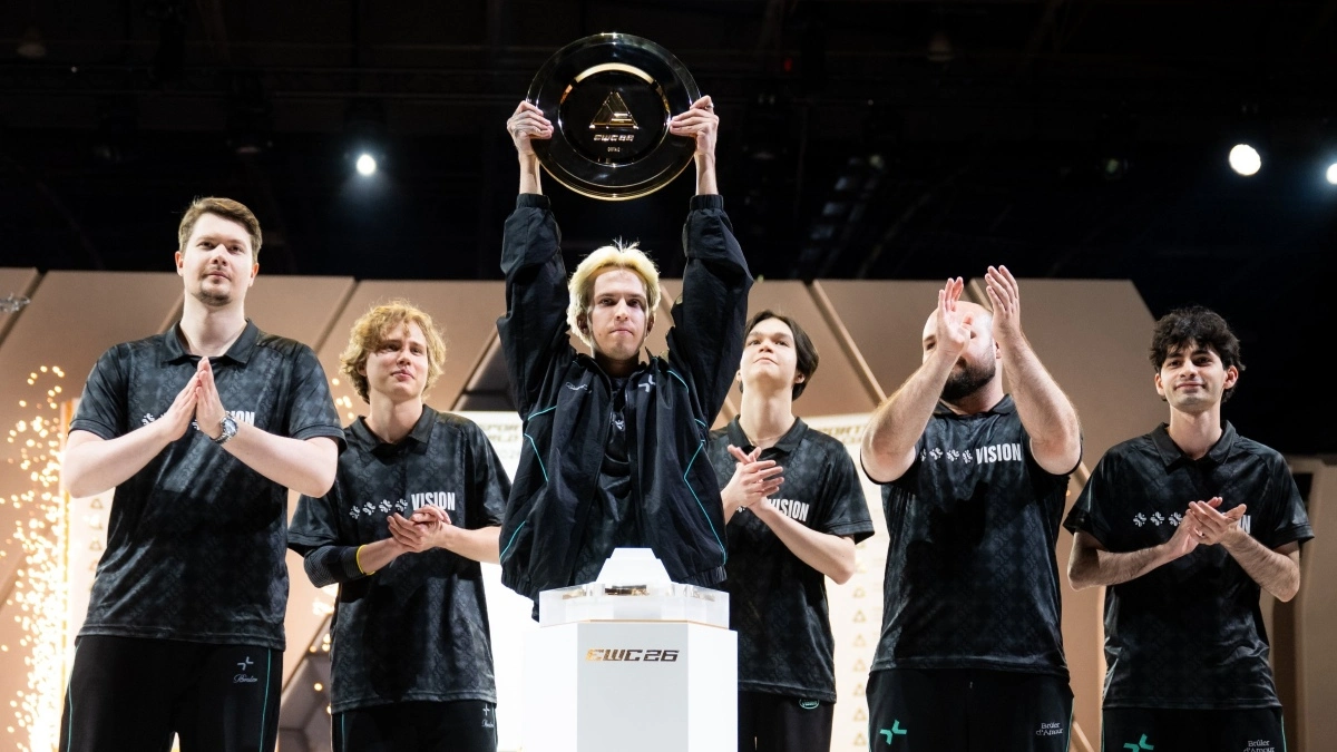 PARIVISION players lifting the EWC 2026 Dota 2 trophy in Paris