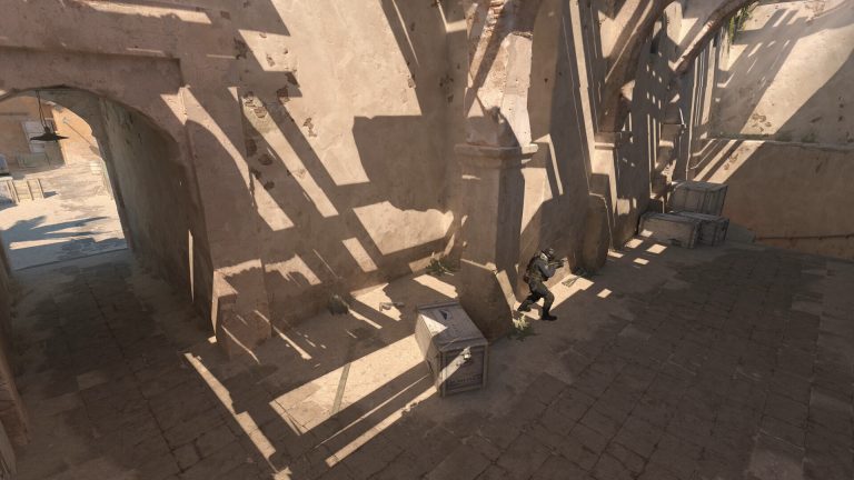Counter-Strike 2 players moving through an official competitive map