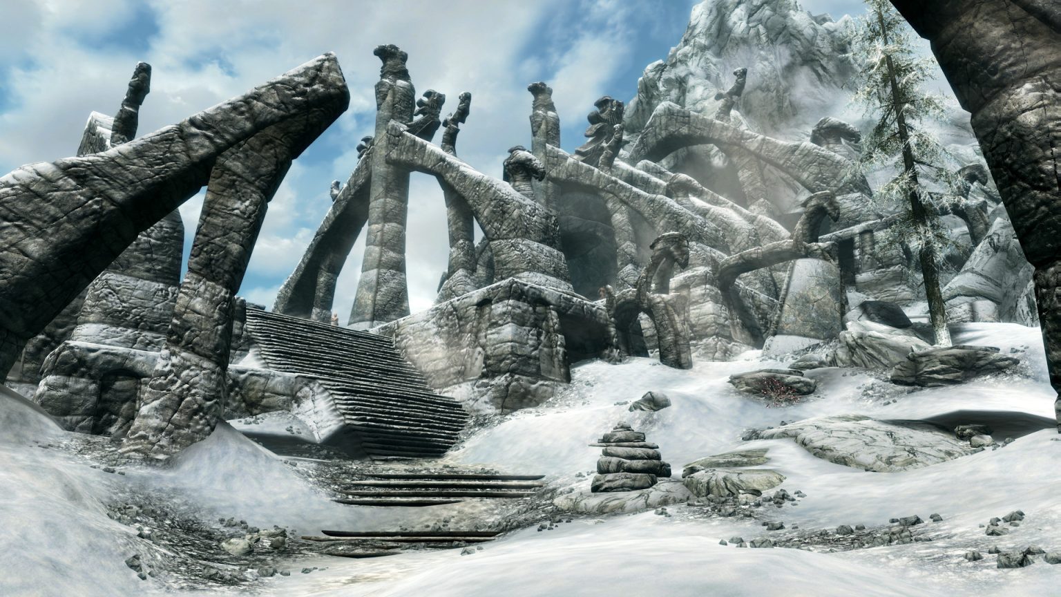 Dragonborn overlooking a snowy valley in Skyrim