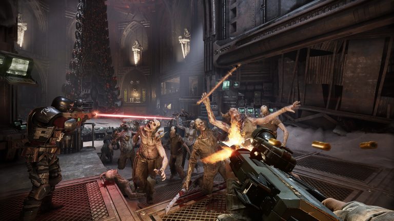 Darktide squad fighting a dense horde of infected enemies